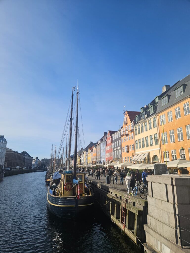 Colourful buildings and boats at Nyhavn in Copenhagen during a European city trip
